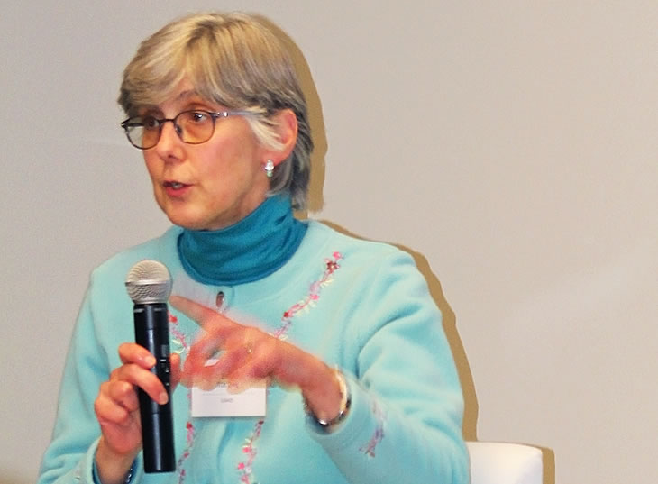 Photo of Ellen Starbird presenting the Keynote.