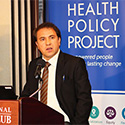 Dr. Omar presenting at the policy forum