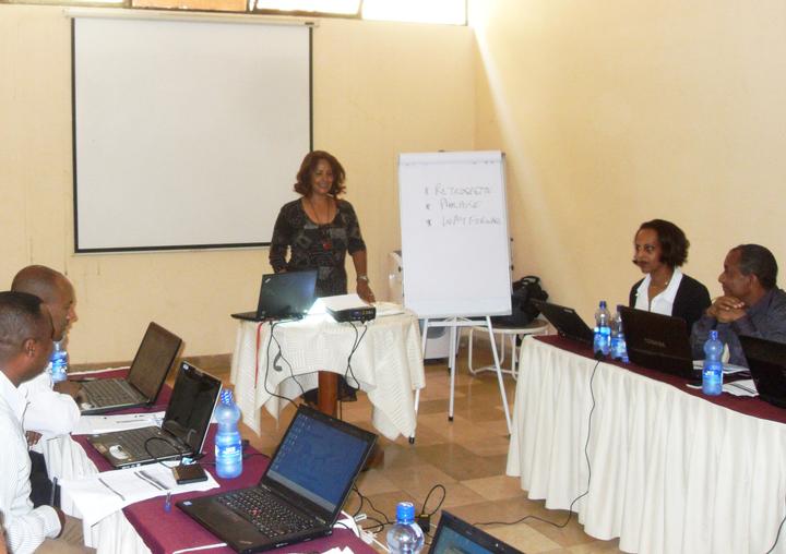 A presenter conducts a technical update training on modeling tools for health and development in Addis Ababa. 