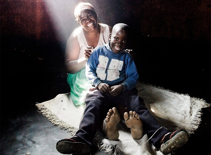 Patience Mapfumo, 37, from Zimbabwe, with her five-year-old son Josphat who was born HIV free.