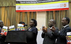 Hon. Sarah Opendi, Uganda's Minister of State for Health, launching the Costed Implementation Plan.